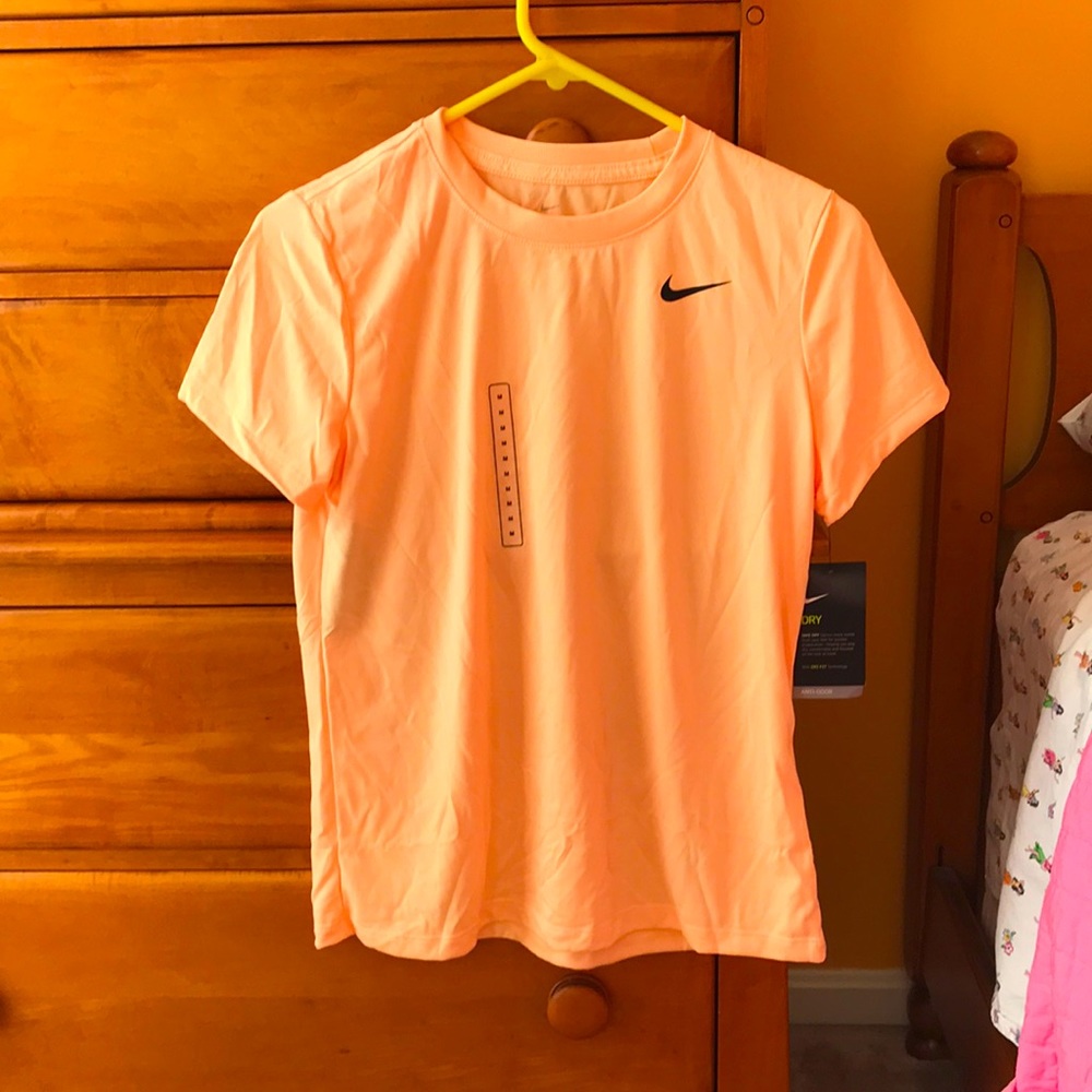 Orange Nike dri-fit shirt